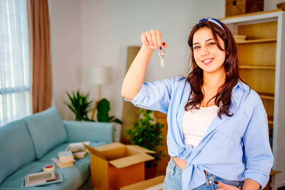 Happy international student after successfully finding student housing in the Netherlands